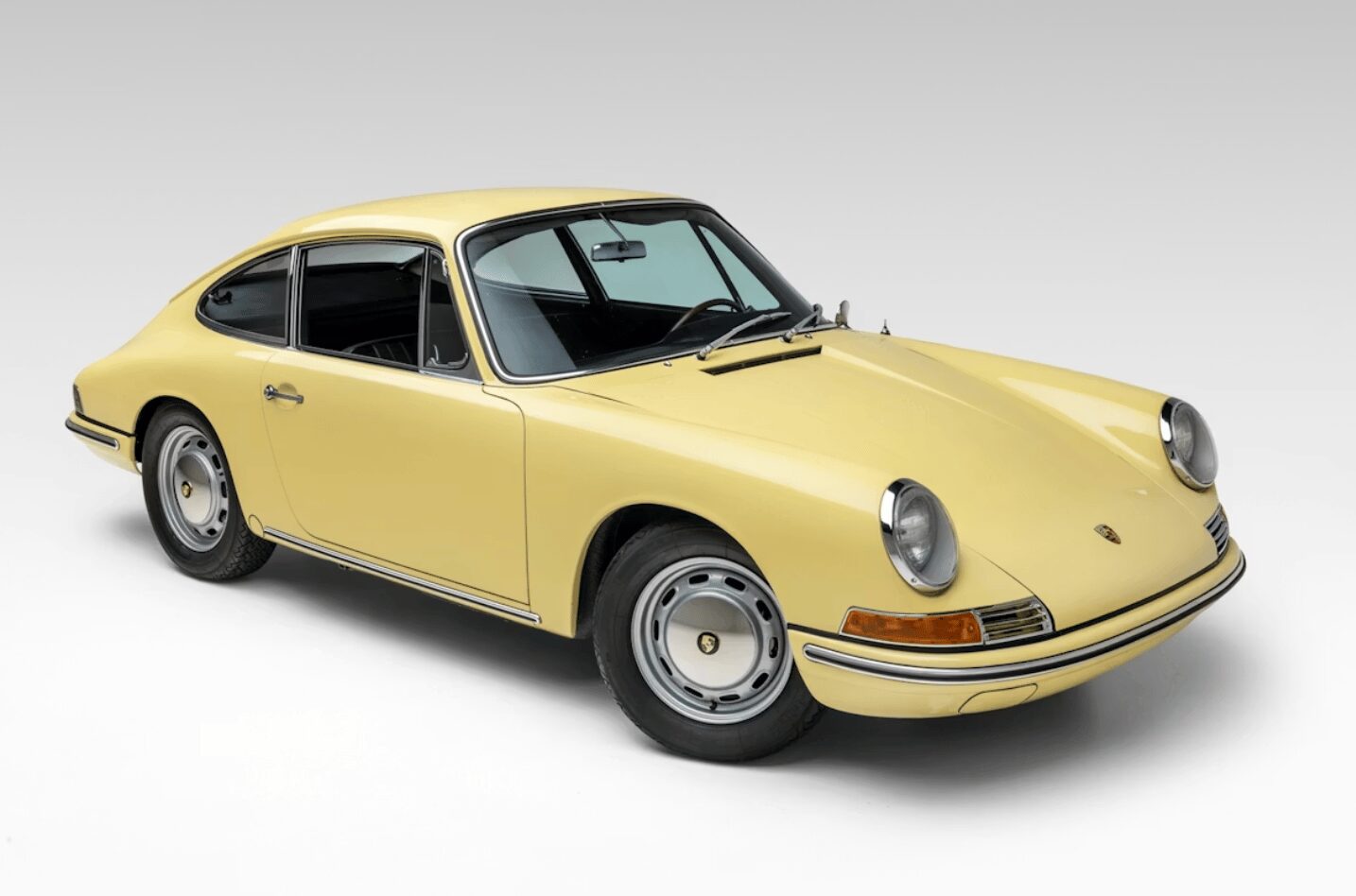 The first 911, a basket case Targa, and an E-Type you can actually import